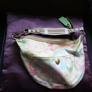 Coach white with pastel C's